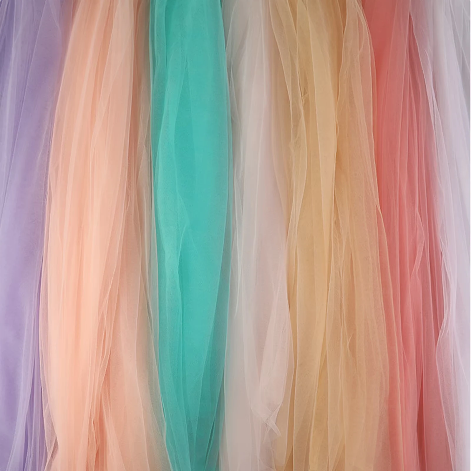 Pastel rolls of dense American mesh fabric